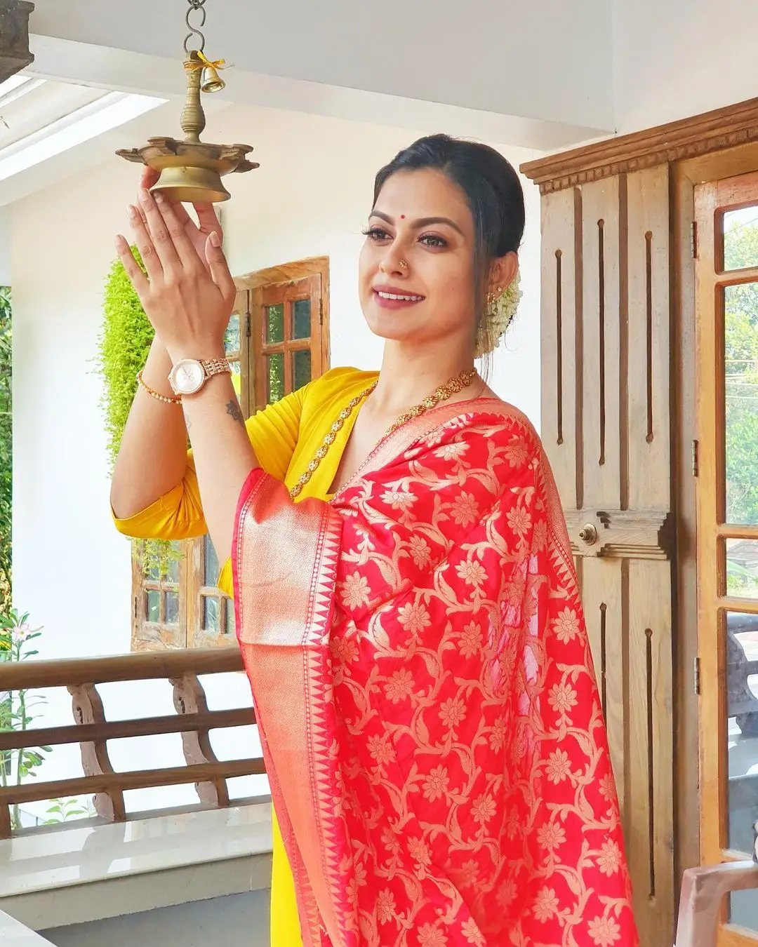 Anusree Nair In South Indian Traditional Yellow Gown